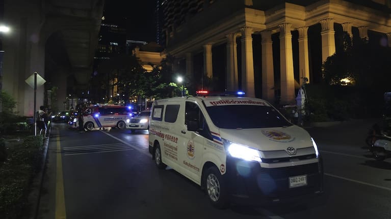 An ambulance sits outside the Grand Hyatt Erawan⁣ Hotel in⁤ Bangkok,​ Thailand.