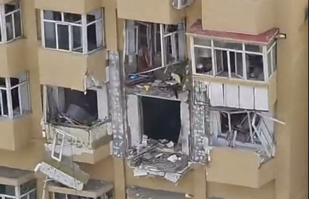 An explosion at an apartment building in northeastern China kills 1 and injures 3