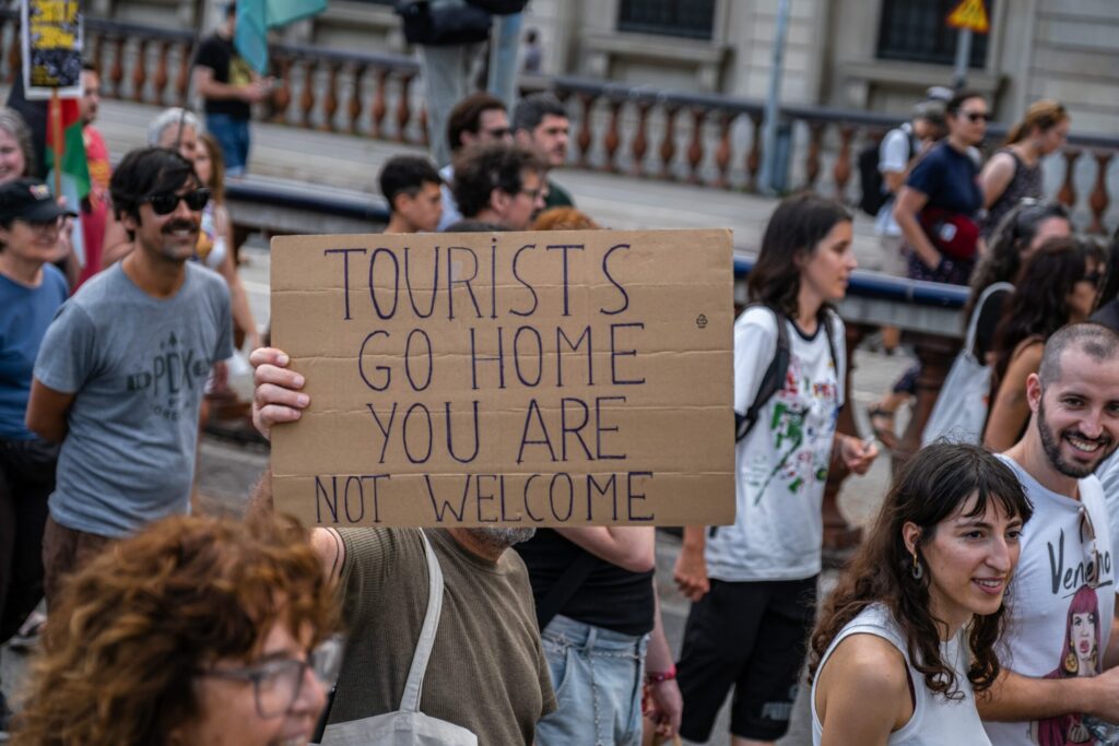 US digital nomads blast ‘xenophobic’ anti-tourism movement in Spain – while others say they’re ‘scared to speak English in public’