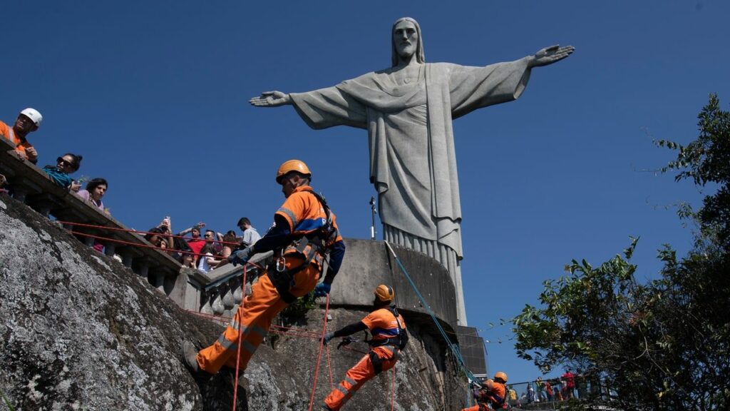 Rio de Janeiro climbers clean site of iconic Christ the Redeemer statue