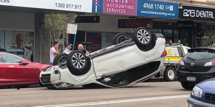 Car flips near popular Sydney beach – News.com.au
