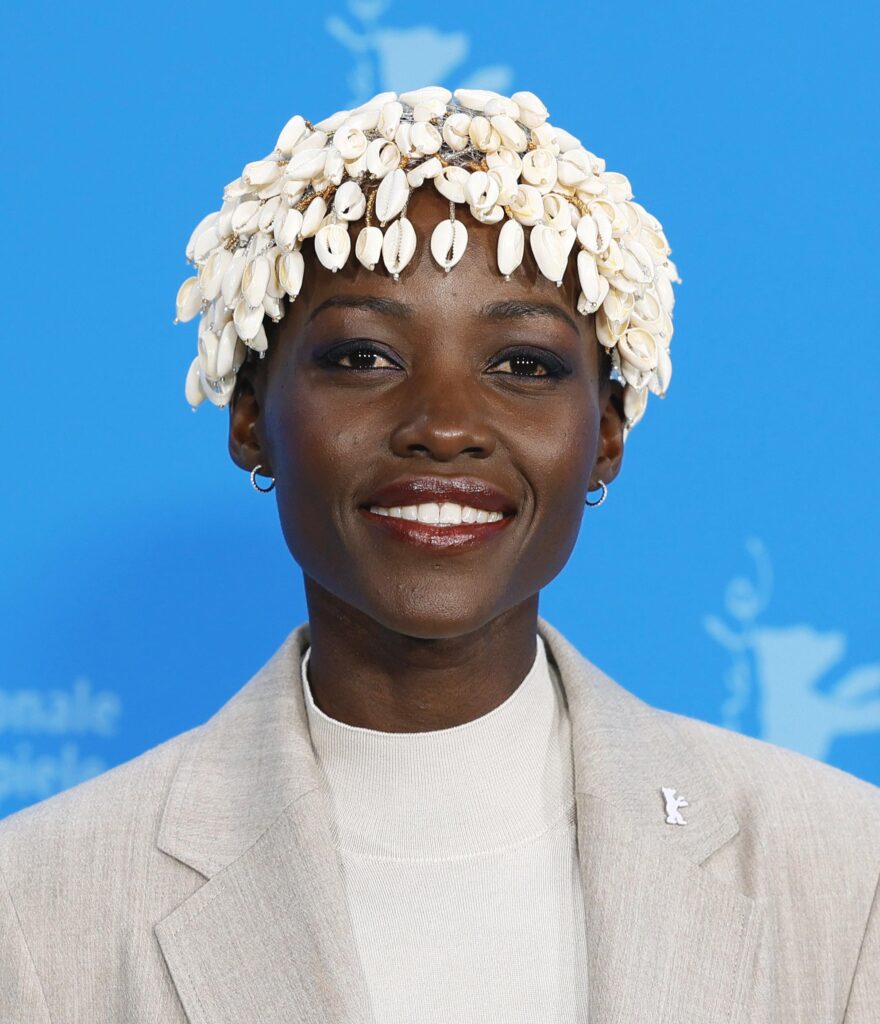 Lupita Nyong’o Bundled Up—in Couture—For Chanel’s Hangzhou Show – Vogue