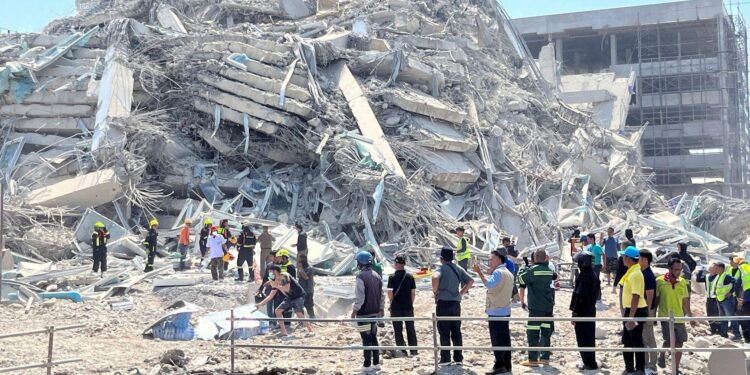 Thai construction tycoon and 14 others surrender to police over fatal Bangkok tower collapse – Reuters