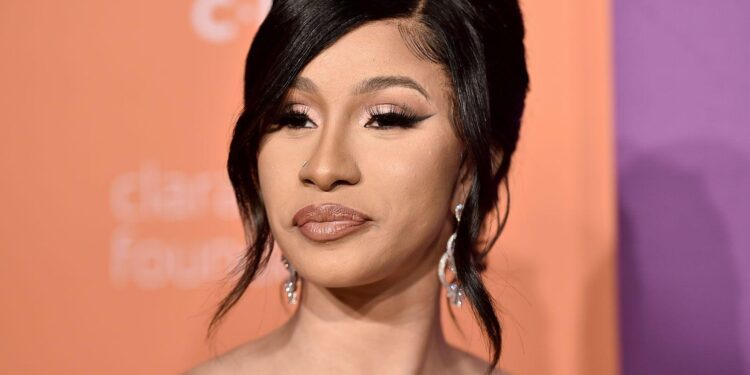 Cardi B Continues Paris Fashion Week 2025 Reign With Exquisite Hooded Dress: See Photos – VIBE.com