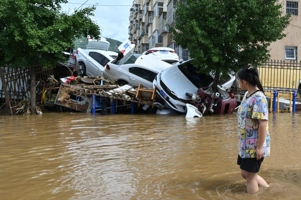 Flooding rain in China’s north leaves two people dead and displaces thousands – The Guardian