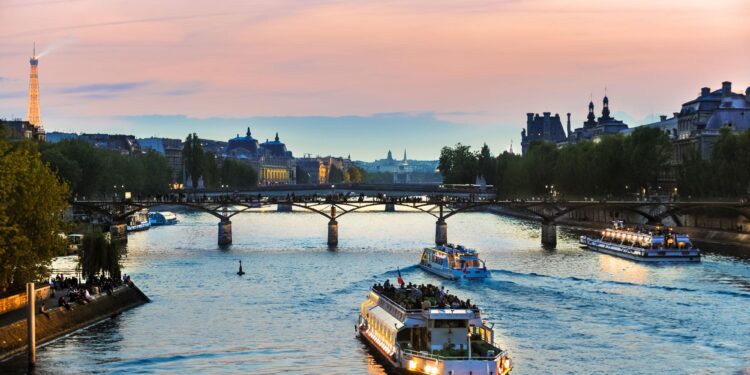 With the Seine open for swimming in Paris, tourists and residents embrace it as temperatures soar – PBS