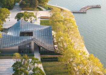 BIG completes glass-tiled pavilion overlooking lake in Suzhou – Dezeen