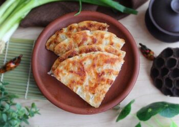 Tall scallions harvested in Shandong – China Daily