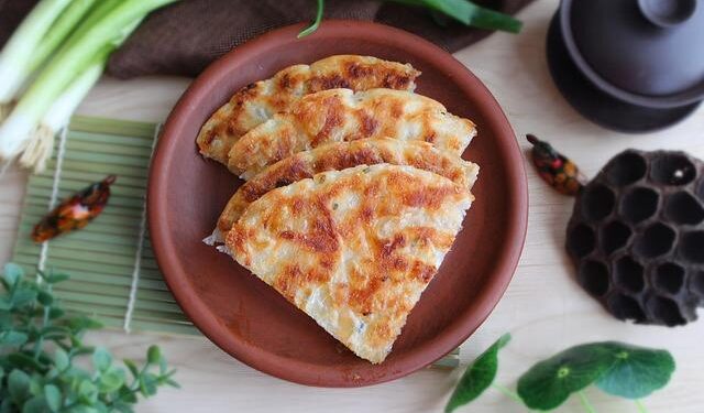 Tall scallions harvested in Shandong – China Daily